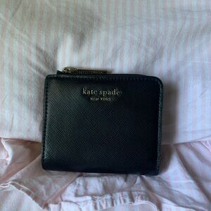kate spade black leather zip-around wallet